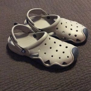 Tan and Black Crocs. Perfect like new condition.
